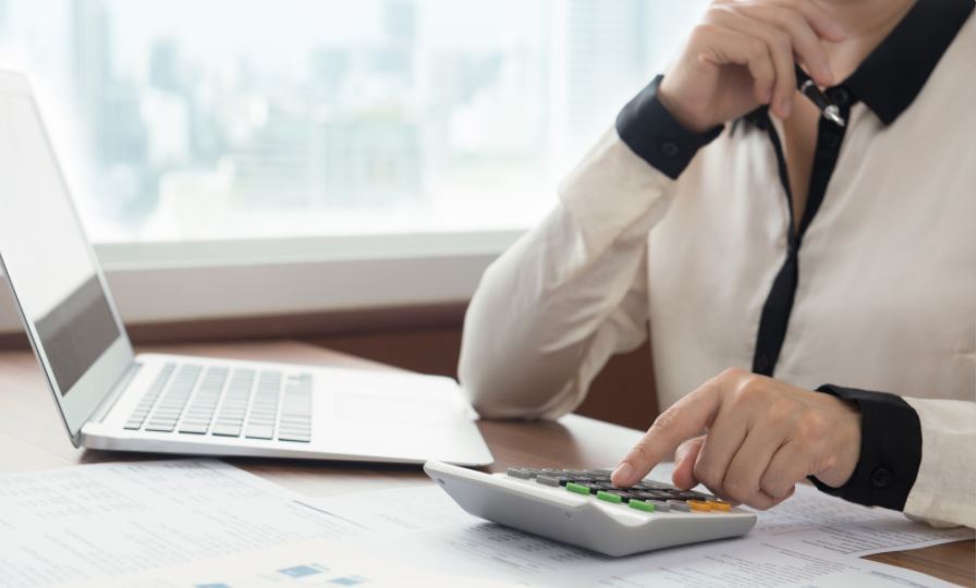 Accountant using calculator