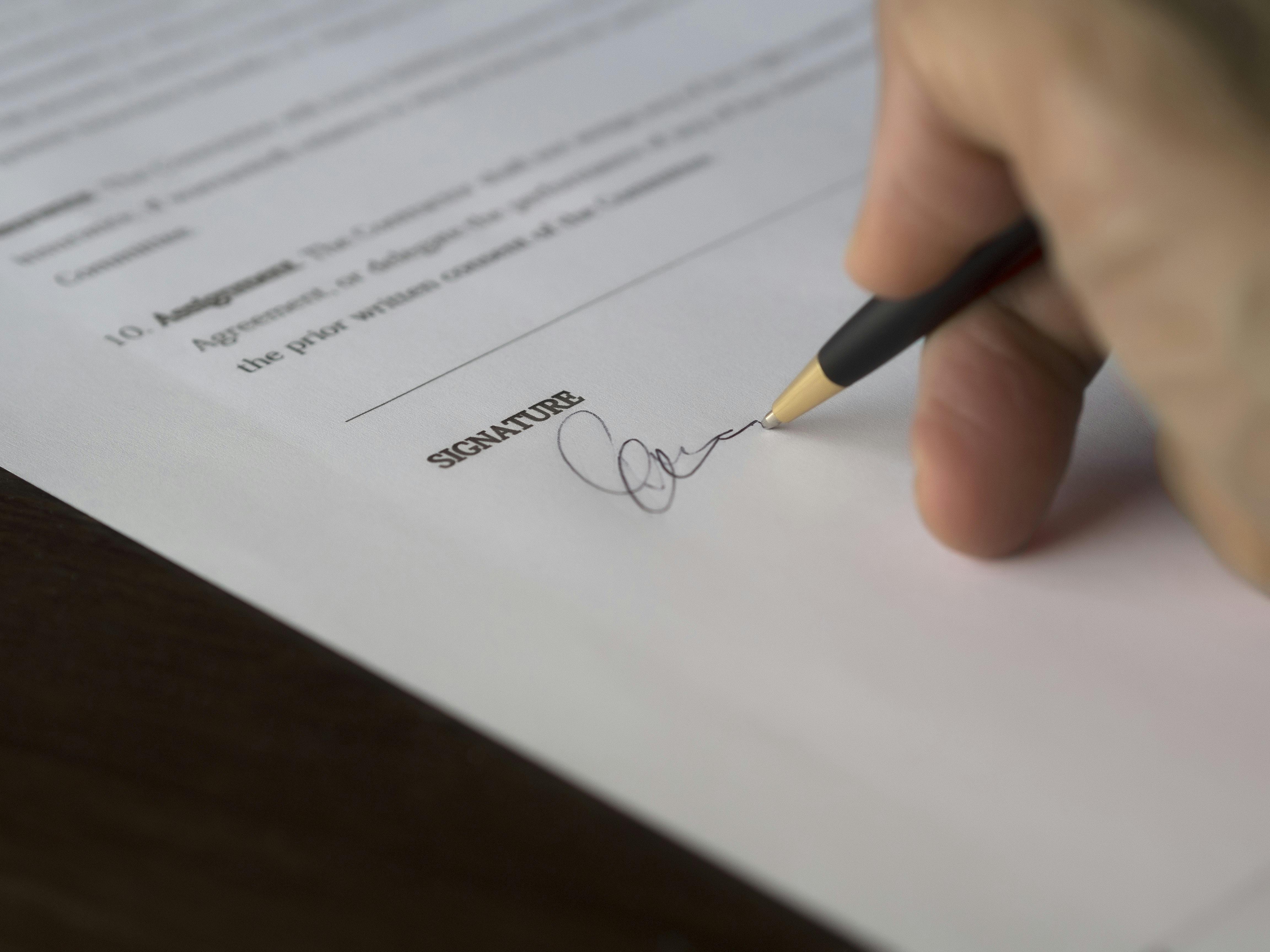 Signing a contract Signing a contract