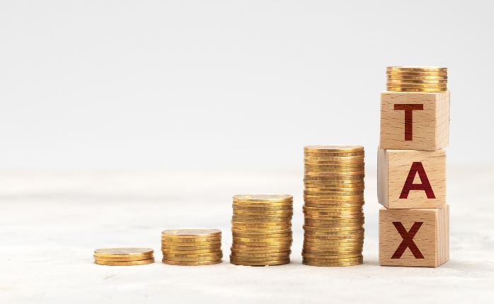 tax image with coins made into stairs