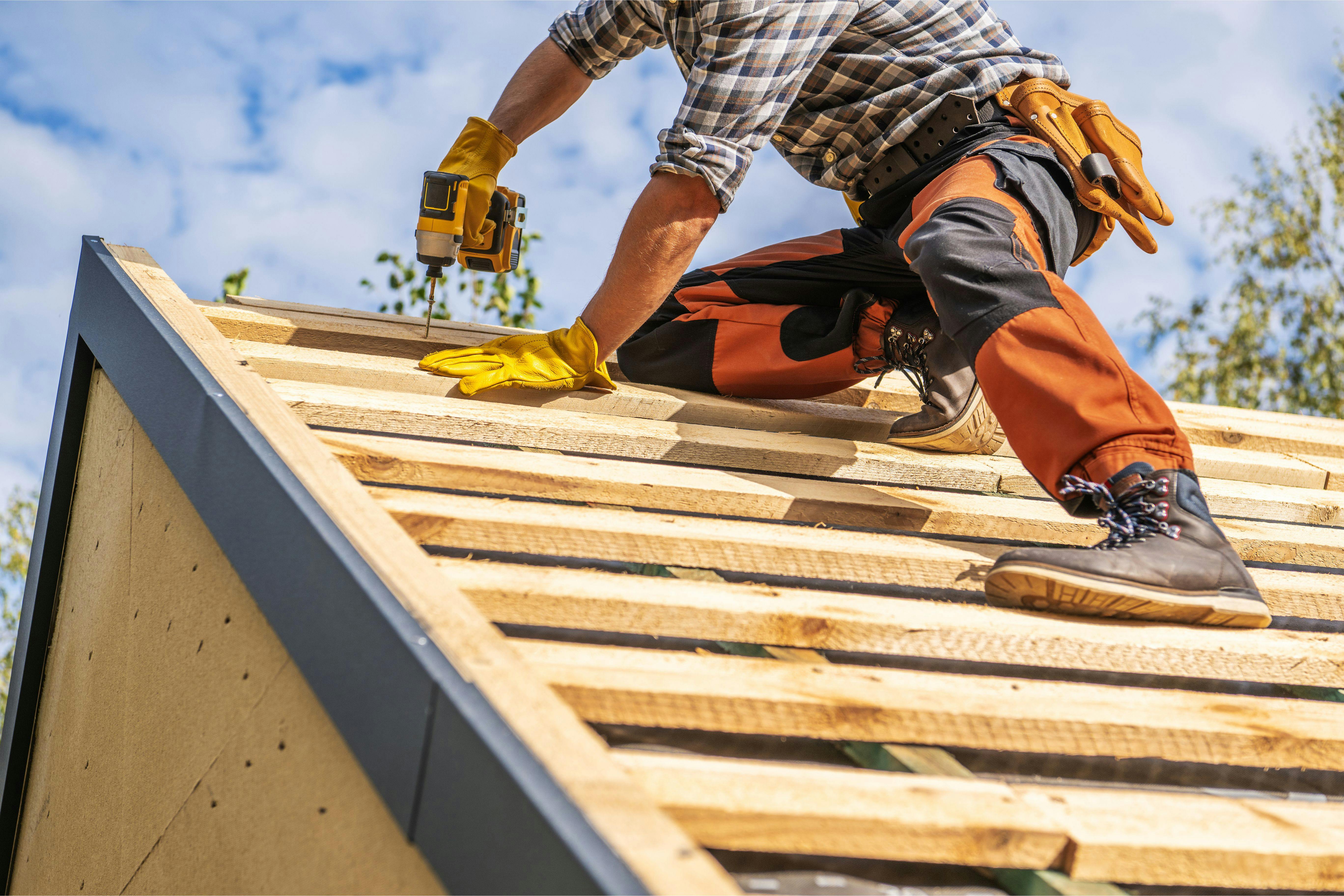 Construction worker Installing a roof